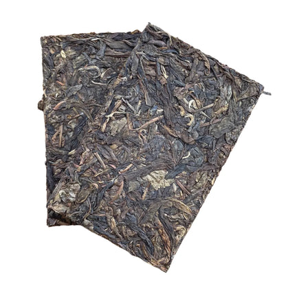 Raw (Sheng) pu-erh Yi Wu Gu Shu "Bamboo Brick" 2009, 500g