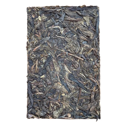 Raw (Sheng) pu-erh Yi Wu Gu Shu "Bamboo Brick" 2009, 500g